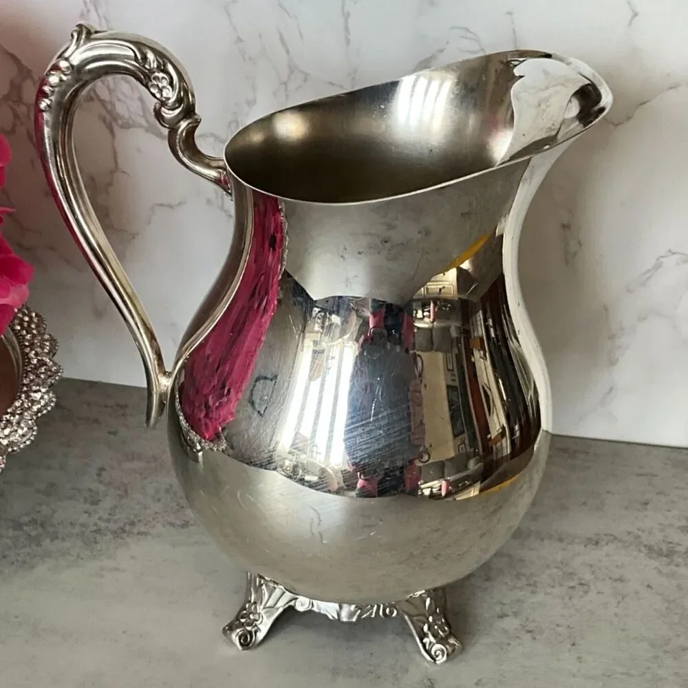 Vintage F. B. Rogers Silver Co. silver plated water pitcher with ice catch